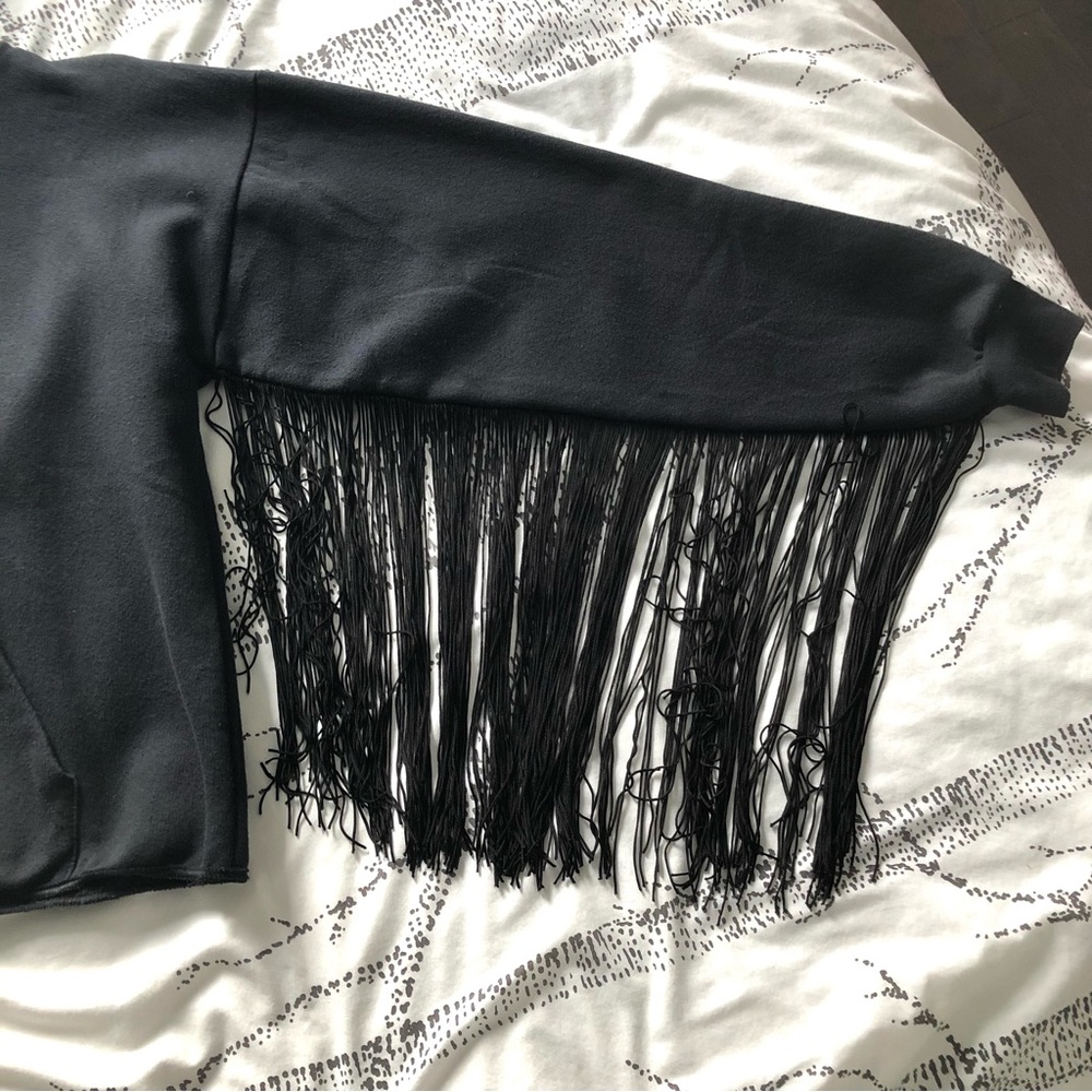 Reconstructed vintage hoodie with fringed sleeves
